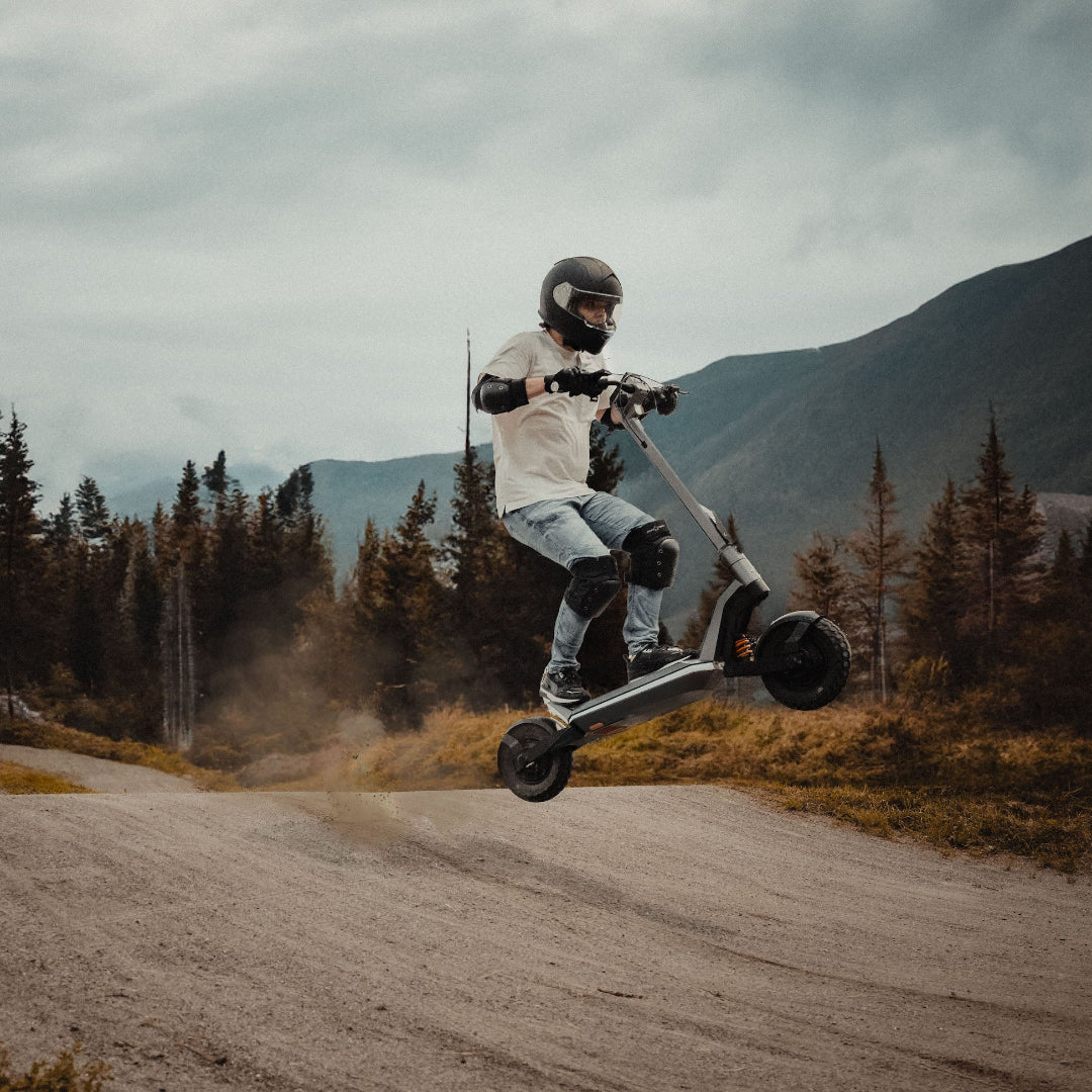 Apollo Pro electric scooter on dirt road