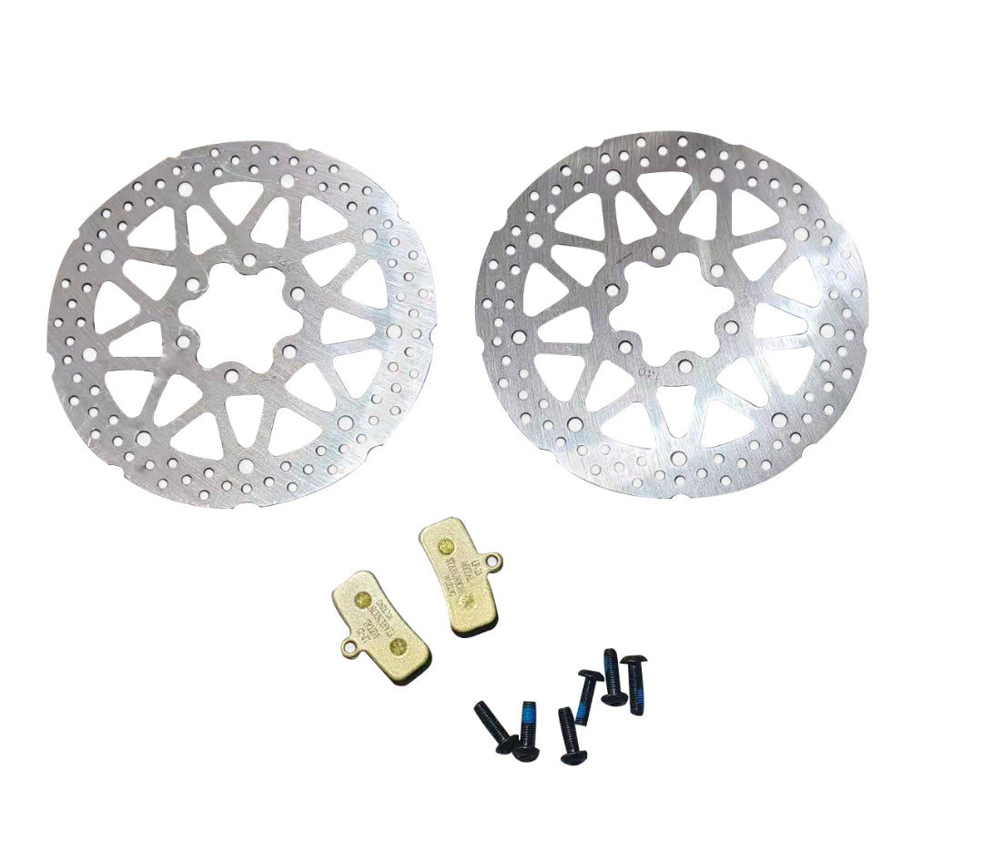 Two electric scooter brake discs with two brake pads and four screws on a white background