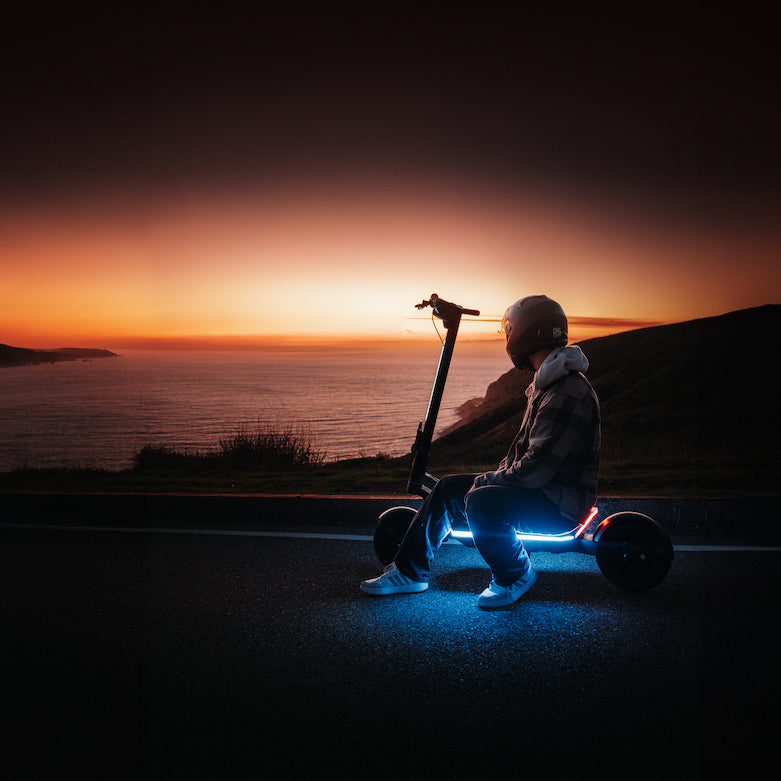 Apollo Pro Scooter with a sunset background