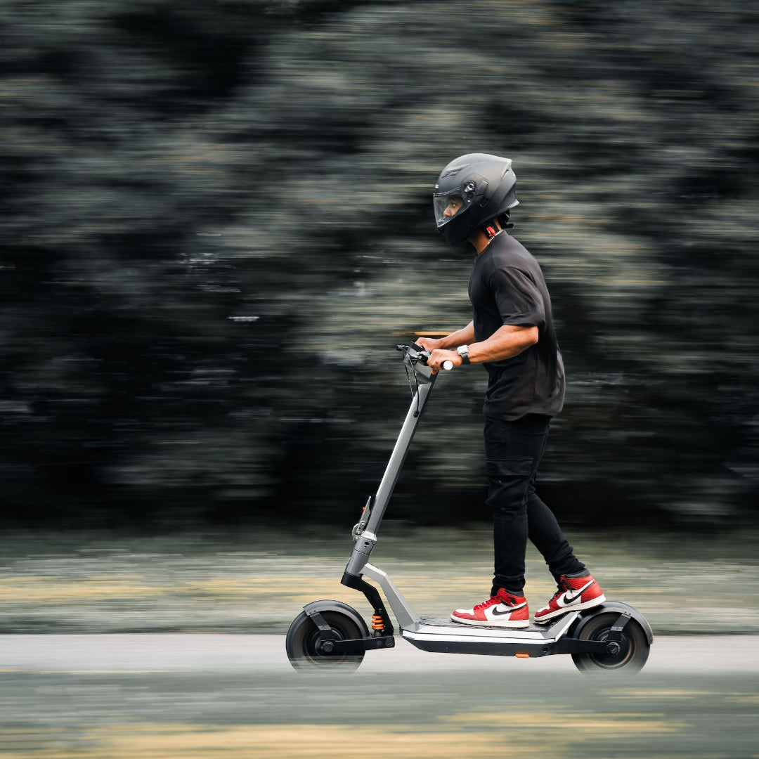 Apollo Pro scooter with a rider on it