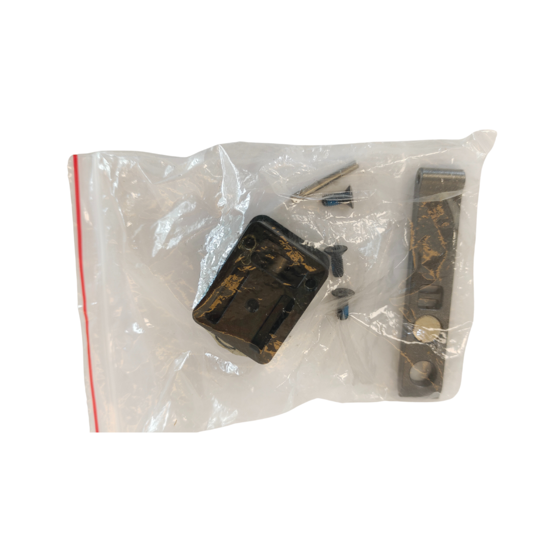 Clear plastic bag with hardware items on a white background