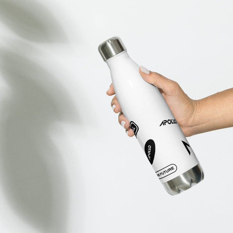 Hand holding a white stainless steel water bottle with Apollo branding on the side.