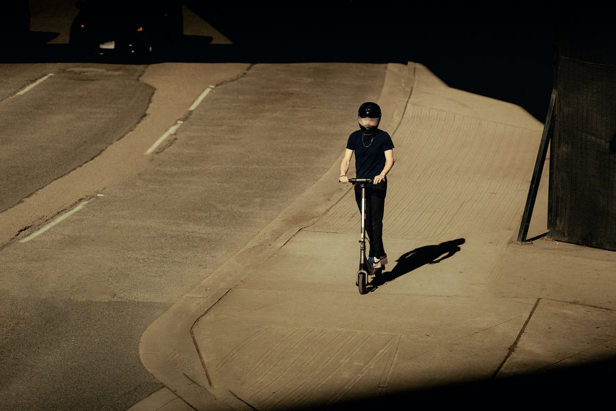 Man riding an Apollo Go on the street