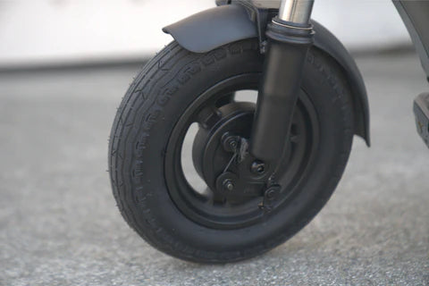 zoomed-in shot of the tire wheel of the Apollo Air e-scooter