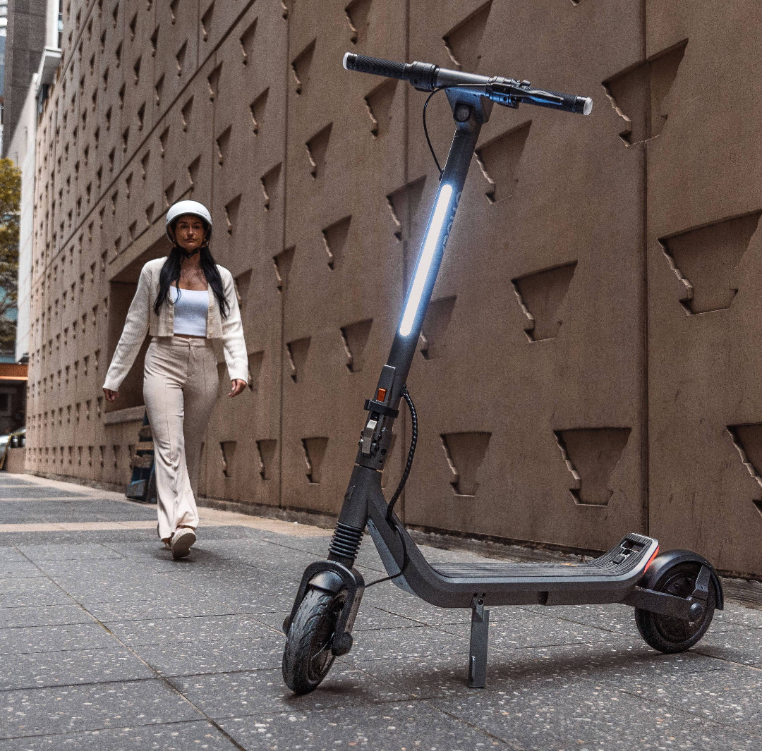 Apollo Go Electric Scooter with Woman