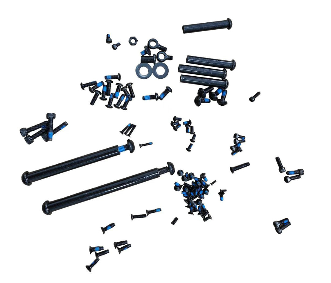 Collection of black and blue screws and bolts on a white background