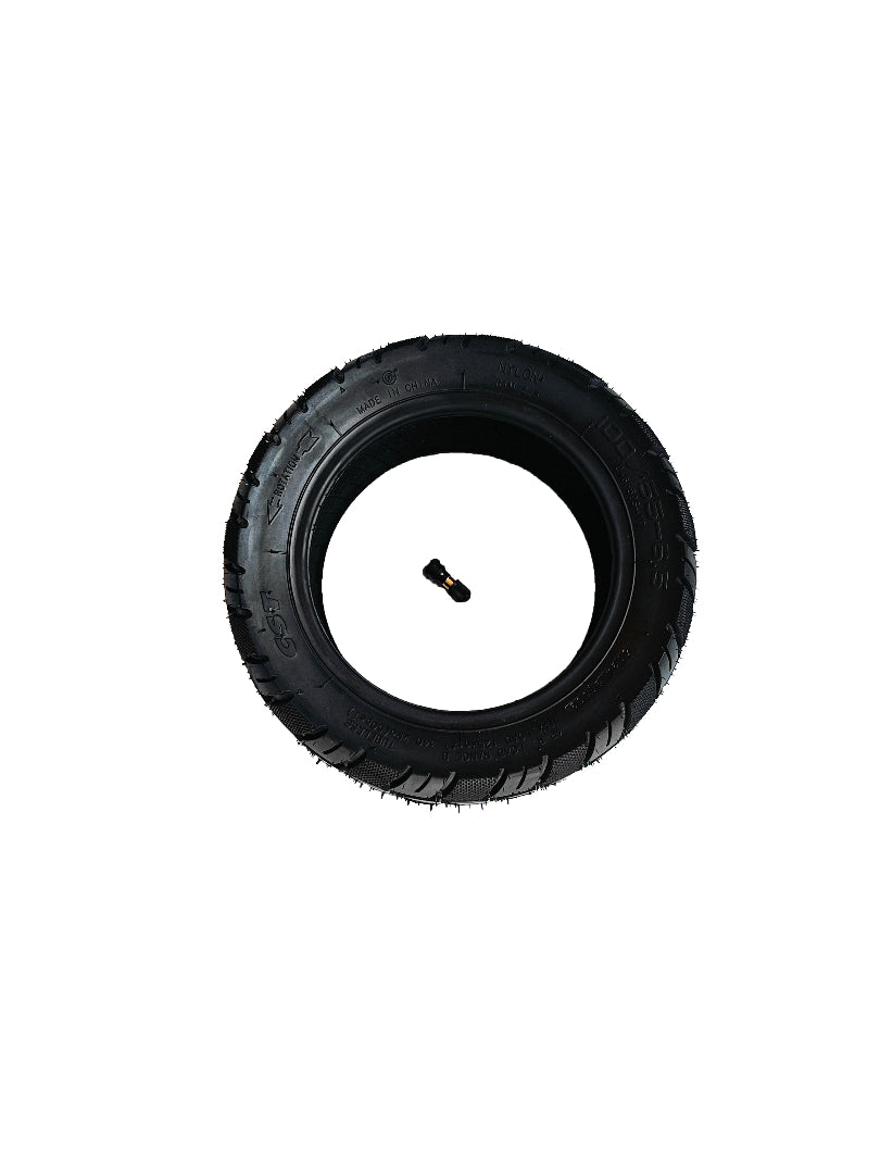 A black tire assembly for a vehicle, against a white background.