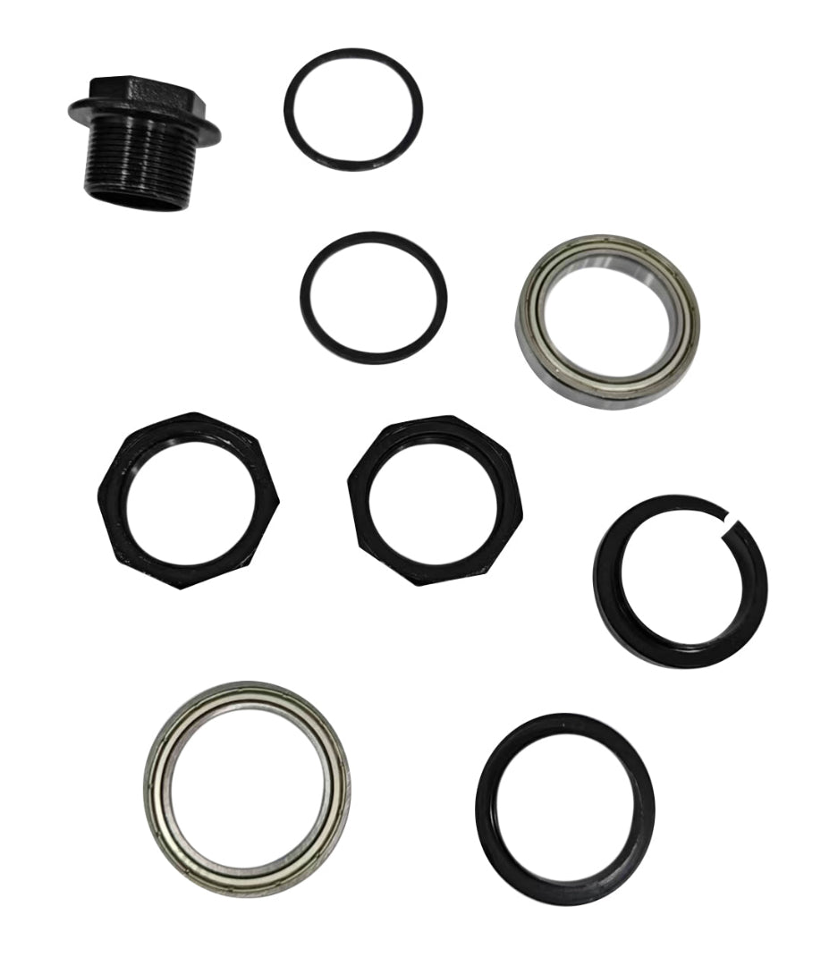 Set of mechanical parts including black hex nuts, washers, and seals on a white background